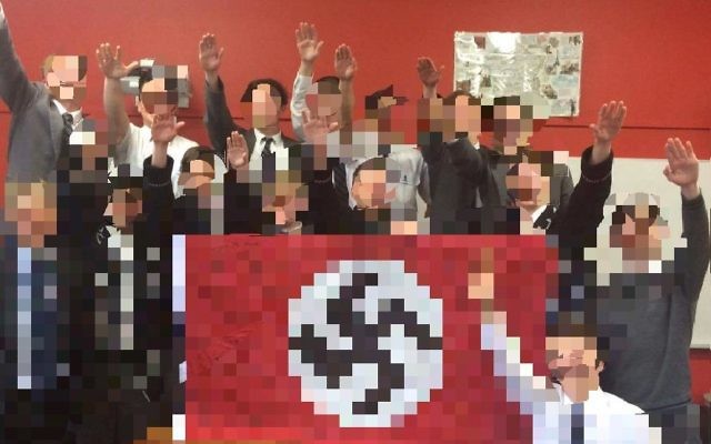 The offending photo of Shore students and their teacher in 2016 posing with a Nazi flag. The offending photo of Shore students and their teacher in 2016 posing with a Nazi flag.