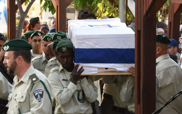 The coffin of Solomon Gabaria, one of the victims of the Har Adar attack, is carried at his funeral. Photo: JPost.com