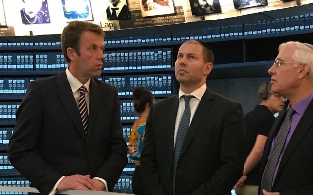 From left: Tehan, Frydenberg and Yad Vashem’s Ephraim Kaye in the Hall of Names.