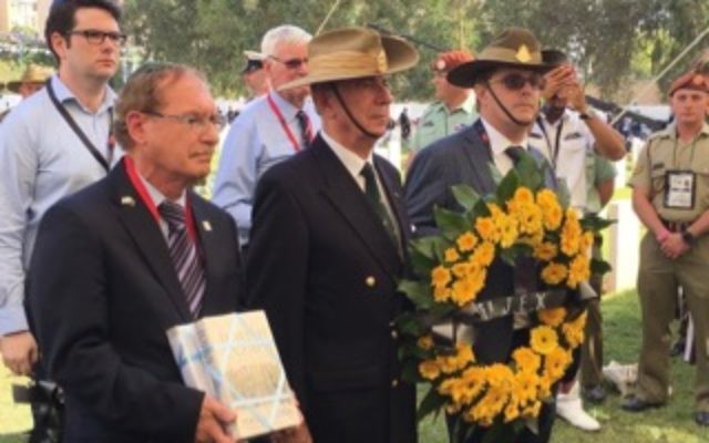 FAJEX delegates Peter Allen, Bob Mountwitten and Andrew Hamilton laying a wreath on Tuesday. Photo: Nathan Jeffay