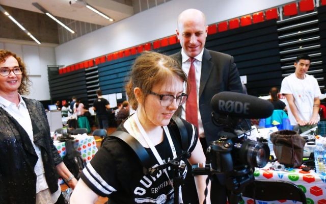 Gidi Grinstein (right) and Amy Marks with her new filming device. Peter Haskin