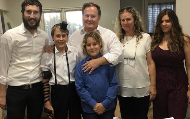 From left: Rabbi Ari Rubin and Barnabas Sarnyai with his father Zoltan, brother Benjamin, mother Katie, and sister Anna. From left: Rabbi Ari Rubin and Barnabas Sarnyai with his father Zoltan, brother Benjamin, mother Katie, and sister Anna.