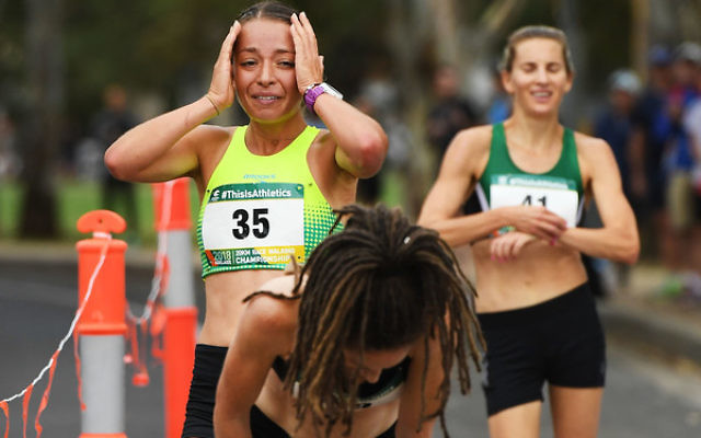 Pure elation. Jemima Montag realising she has just qualified for the Commonwealth Games in race walking. Photo: Mark Brake/
Getty Images AsiaPac