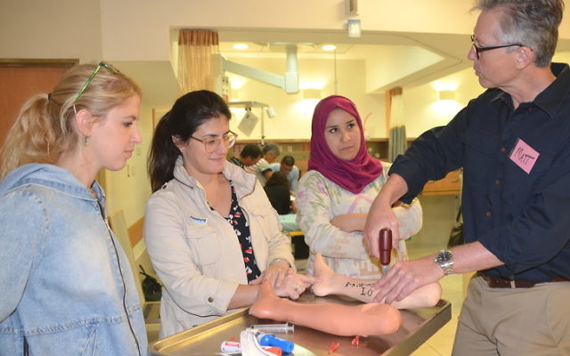 Dr Matthew O'Meara with Israeli and Palestinian students at Hadassah.