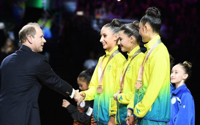 Prince Edward presenting Alexandra Kiroi-Bogatyreva with a bronze medal. Photo: Mark Avellino/Gymnastics Australia