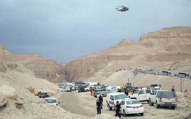 A military helicopter searches for the missing teens at Nahal Tzafit. Photo: Hadas Parush/Flash90