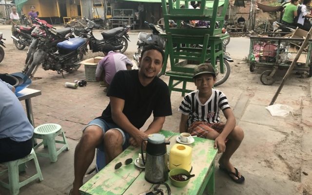 Richie Harkham with Tai, an 11-year-old boy he met in Myanmar.