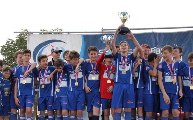 The Maccabi Hakoah Amigos celebrate winning the 2018 Eastern Suburbs Football Association boys' U13 division 3 premiership at Hensley Stadium on August 25. Photo: Shane Desiatnik The Maccabi Hakoah Amigos celebrate winning the 2018 Eastern Suburbs Football Association boys' U13 division 3 premiership at Hensley Stadium on August 25. Photo: Shane Desiatnik