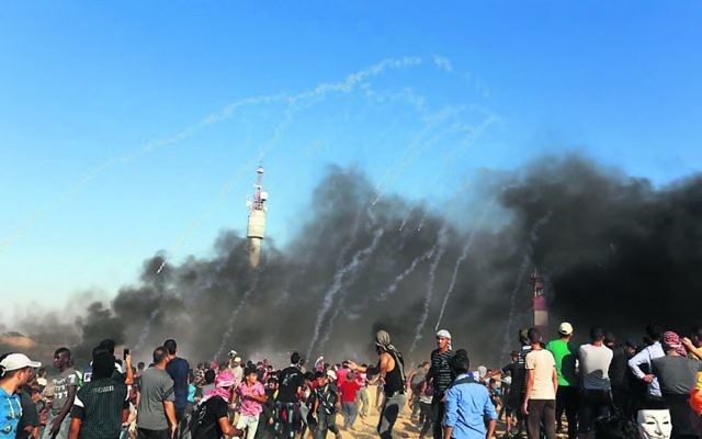 Palestinian protesters during clashes with Israeli security forces on the Gaza Israeli border on July 20. Photo: Abed Rahim Khatib/Flash90