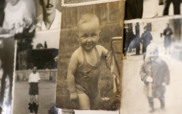 Mordechai Glasman (centre) with his parents shortly after immigrating to Israel.
