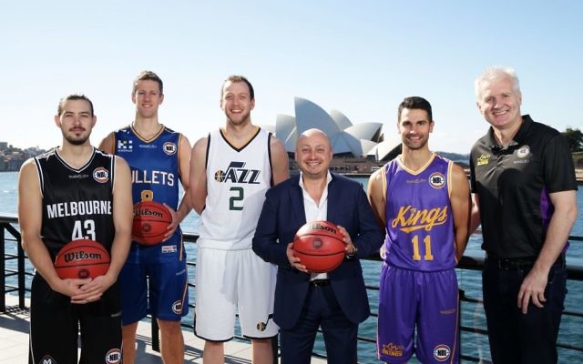 From left: Melbourne United's Chris Goulding, former Brisbane Bullets and new Sydney Kings recruit Daniel Kickert, Joe Ingles from NBA's Utah Jazz, NBL owner Larry Kestelman, Sydney Kings captain Kevin Lisch and Kings' coach Andrew Gaze. Photo: Matt King/Getty Images/NBL.