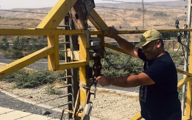 Shai Hadar, a refreshment merchant, gatekeeper, site manager, and tour guide, has the keys to Jordan from Naharayim.