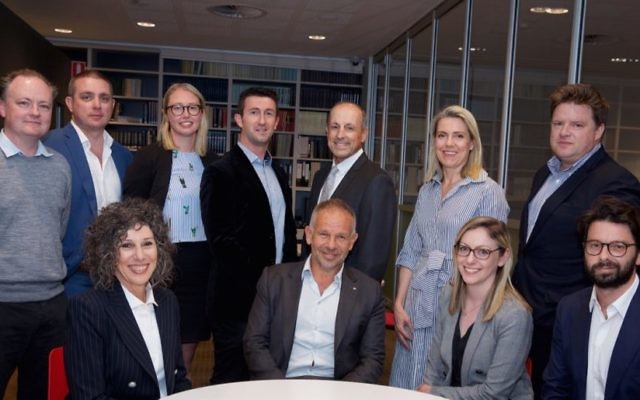 Front row: Suzy and Phillip Wolanski, Elizabeth Daniels, Leo Shanahan. Back: James Madden, Simon King, Danielle Pogson, Adam Creighton, Vic Alhadeff, Kate de Brito, Nick O'Malley. Photo: Giselle Haber