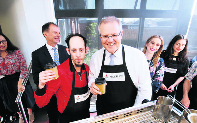 Josh Ferenbach serving Scott Morrison coffee. Photo: Peter Haskin
