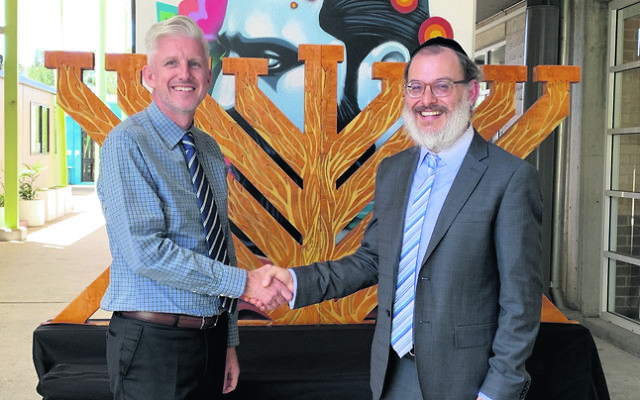 The old and the new: John Hamey (left) and Rabbi Yehoshua Smukler. The old and the new: John Hamey (left) and Rabbi Yehoshua Smukler.