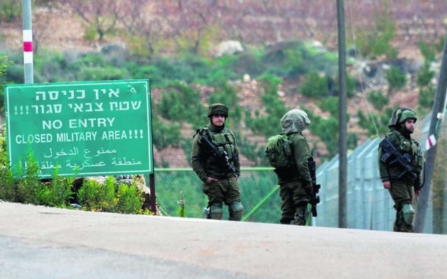 IDF personnel in Metulla on Tuesday. Photo: AP Photo/Ariel Schalit