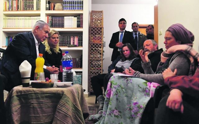 Benjamin and Sara Netanyahu pay their respects to the family of Ori Ansbacher. Photo: Kobi Gideon/GPO