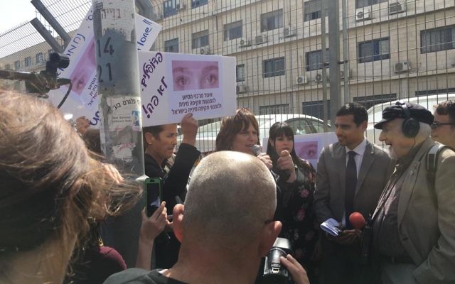 Dassi and Manny Waks among the protesters outside court on Wednesday.