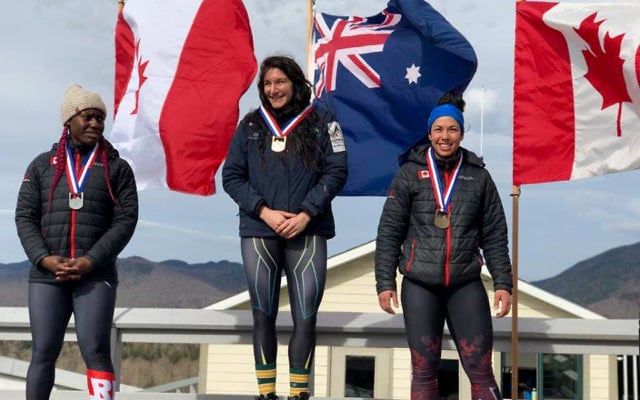 Australia’s Ashleigh Werner (centre) at the women’s monobob medal presentation at Lake Placid, USA, on April 13. Australia’s Ashleigh Werner (centre) at the women’s monobob medal presentation at Lake Placid, USA, on April 13.