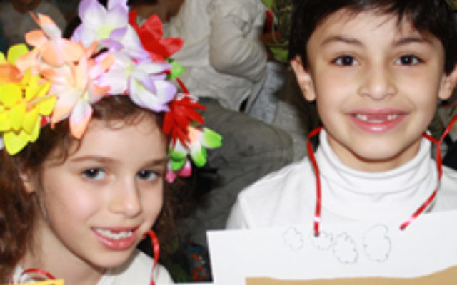 Bialik College students Amber Besser and Edward Ades preparing for Shavuot. Photo: AJN.