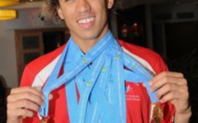 American swimmer Marcus Schlesinger won 8 gold at the MAIGS. Photo: Henry Benjamin. American swimmer Marcus Schlesinger won 8 gold at the MAIGS. Photo: Henry Benjamin.