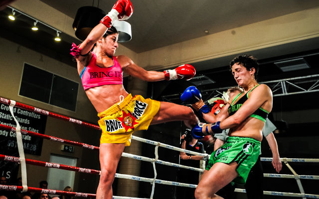 Tali Silbermann (left) kicking her way to a title. Tali Silbermann (left) kicking her way to a title.