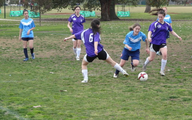 Nat Court skips past an attempted tackle. Photo: Daniel Blau
