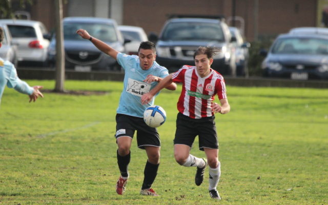 Dominic Paul battles for possession earlier this season. Photo: Mick Ashworth