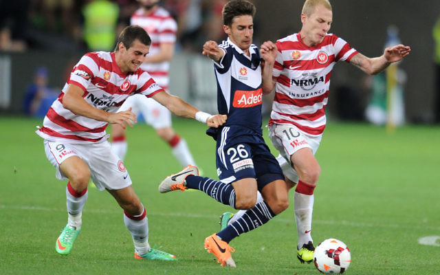 Jordan Brown contests the ball against Aaron Mooy (right) and Tomi Juric of the
Western Sydney Wanderers during an 2013/14 A-League round-19 match at AAMI
Park in Melbourne. Photo: Vince Caligiuri/Getty Images Jordan Brown contests the ball against Aaron Mooy (right) and Tomi Juric of the
Western Sydney Wanderers during an 2013/14 A-League round-19 match at AAMI
Park in Melbourne. Photo: Vince Caligiuri/Getty Images
