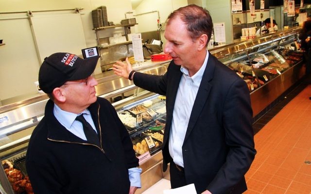 Eric Silver (left) of Solomon Kosher Butcher discussing the upcoming holiday with David Southwick. Photo: Peter Haskin Eric Silver (left) of Solomon Kosher Butcher discussing the upcoming holiday with David Southwick. Photo: Peter Haskin