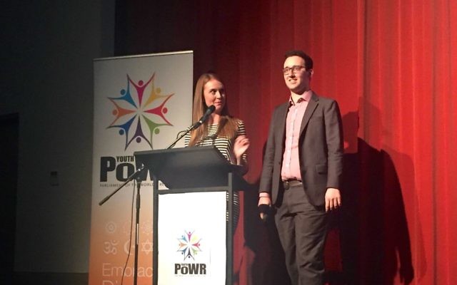 Glen Falkenstein (right) with co-emcee Ashleigh Green. Glen Falkenstein (right) with co-emcee Ashleigh Green.