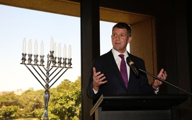Mike Baird
celebrating Chanukah
last week at
Parliament House.
Photo: Noel Kessel