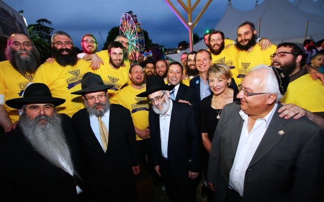 The organisers of Chanukah in the Racecourse with the attending politicians. Photo: Peter Haskin