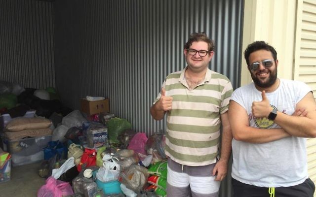 Shmoo Burnie (right) with Daniel Gerson and the some of the goods they delivered to people who were affected by the fires in Western Australia.