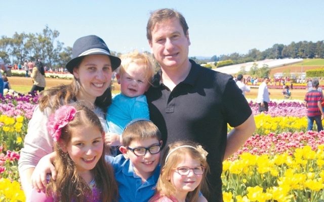 Yitzchak Rosen with his wife Jacqui and their four children.