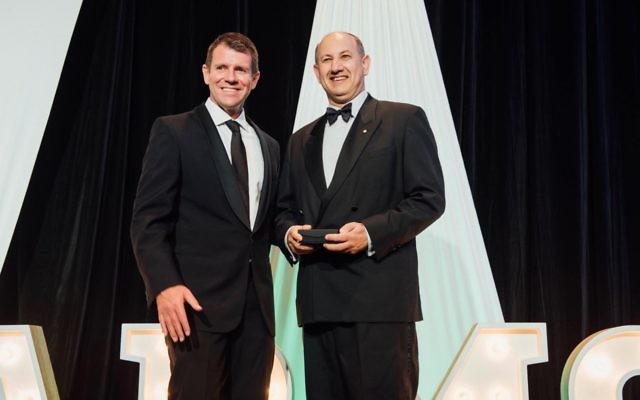 Jeremy Jones (right) receives the Harmony Award from Premier Mike Baird last week. Jeremy Jones (right) receives the Harmony Award from Premier Mike Baird last week.