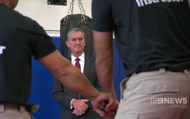 Andrew Scipione learning about Israeli crime-fighting techniques. Photo: Courtesy Nine News Andrew Scipione learning about Israeli crime-fighting techniques. Photo: Courtesy Nine News