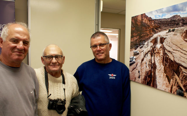 Arava photography delegation members Danny Hadas, Alex Levac and Gilad Livni next to Livni’s stunning photograph, captured using a drone, of the rare flooding of the Arava desert valley floor. Arava photography delegation members Danny Hadas, Alex Levac and Gilad Livni next to Livni’s stunning photograph, captured using a drone, of the rare flooding of the Arava desert valley floor.
