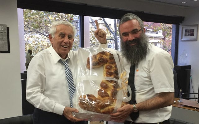 Our Big Kitchen’s Rabbi Dovid Slavin took a large challah in the shape of the number one to Harry Triguboff when he was named the richest person in Australia. Our Big Kitchen’s Rabbi Dovid Slavin took a large challah in the shape of the number one to Harry Triguboff when he was named the richest person in Australia.