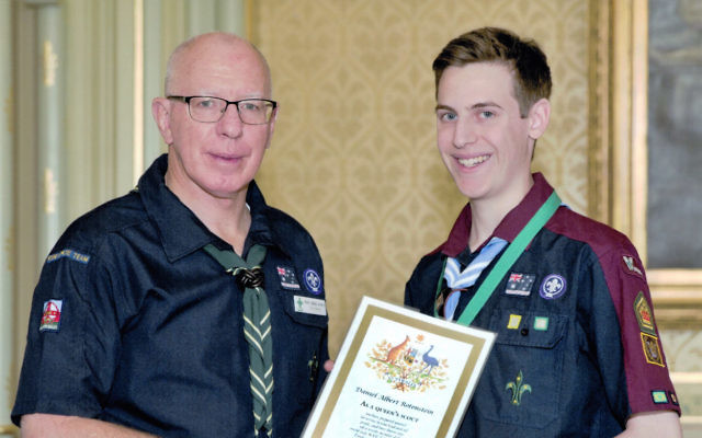 NSW Governor David Hurley presents Daniel Rotenstein with his award. Photo: Noel Kessel.