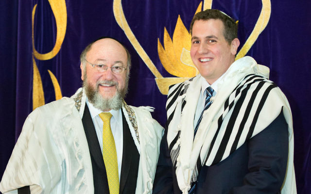 Rabbi Ephraim Mirvis with his son Rabbi Danny Mirvis at the induction ceremony at Mizrachi Synagogue. Rabbi Ephraim Mirvis with his son Rabbi Danny Mirvis at the induction ceremony at Mizrachi Synagogue.