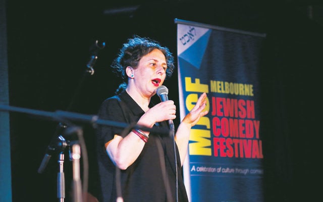 Festival creative director Justine Sless doing stand-up at the Melbourne Jewish Comedy Festival. Photo: Peter Haskin Festival creative director Justine Sless doing stand-up at the Melbourne Jewish Comedy Festival. Photo: Peter Haskin