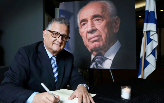Richard Balkin signing the ZCNSW condolence book in honour of Shimon Peres.
Photo: Noel Kessel. Richard Balkin signing the ZCNSW condolence book in honour of Shimon Peres.
Photo: Noel Kessel.