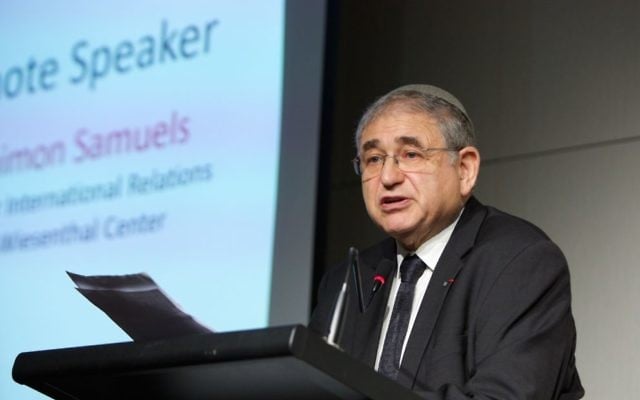 Dr Shimon Samuels speaking at the Kristallnacht Commemoration in Sydney. Photo: Giselle Haber