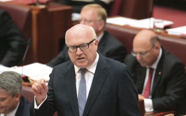 Attorney-General George Brandis has argued that people have the "right to be a bigot". Photo: AAP Images/Lukas Coch Attorney-General George Brandis has argued that people have the "right to be a bigot". Photo: AAP Images/Lukas Coch