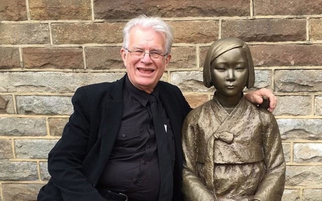 Reverend Bill Crews with the statue memorialising Korean sex slaves. Reverend Bill Crews with the statue memorialising Korean sex slaves.