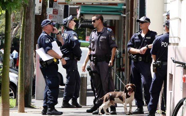 Police outside the Sydney Jewish Museum on Tuesday. Photo: Noel Kessel Police outside the Sydney Jewish Museum on Tuesday. Photo: Noel Kessel