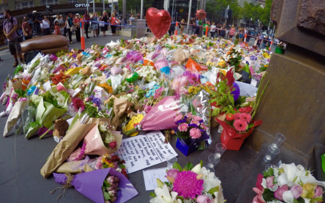 Flowers were laid in Bourke St in memory of the victims of the attack. Flowers were laid in Bourke St in memory of the victims of the attack.