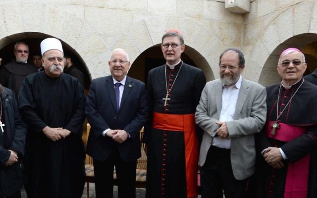 Israel's president Reuven Rivlin joined leaders from different faiths at the reopening of the vandalised church in the Galilee. Israel's president Reuven Rivlin joined leaders from different faiths at the reopening of the vandalised church in the Galilee.
