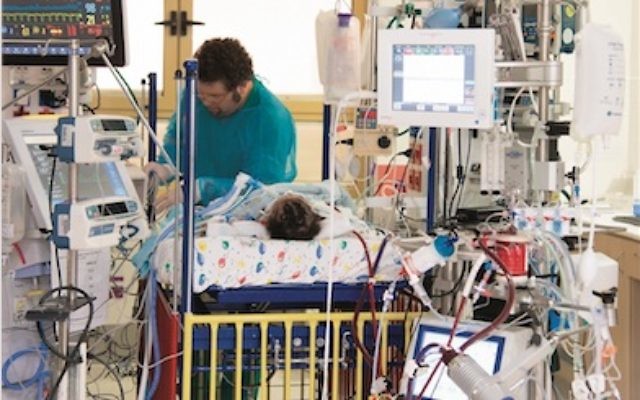A baby from Gaza with congenital heart disease being treated at Sheba Hospital. A baby from Gaza with congenital heart disease being treated at Sheba Hospital.